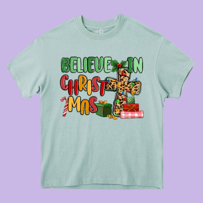 Believe In Christmas Heavy Core Tee Designed By Maliassmallbusiness