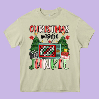 Christmas Movie Junkie Heavy Core Tee Designed By Maliassmallbusiness