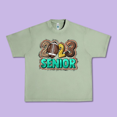 2023 Senior Football Urban Heavy Tee Designed By Nancycooperartshop