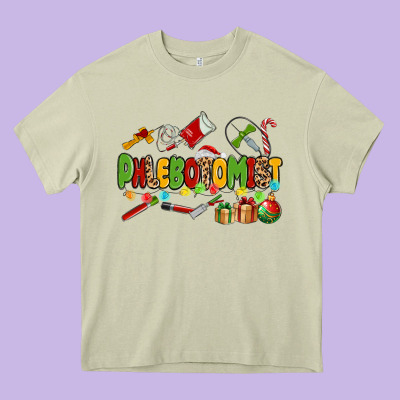 Christmas Phlebotomist Heavy Core Tee Designed By Maliassmallbusiness