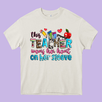 This Teacher Wears Her Her On Her Sleeve Heavy Core Tee Designed By Nancycooperartshop