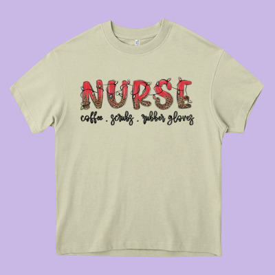 Christmas Nurse Heavy Core Tee Designed By Maliassmallbusiness