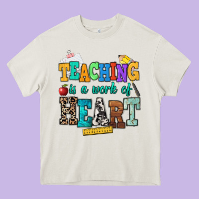 Teaching Is A Work Of Heart Heavy Core Tee Designed By Nancycooperartshop