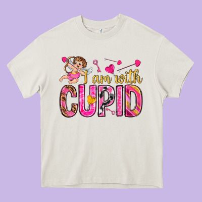 I Am With Cupid Heavy Core Tee Designed By Nancycooperartshop