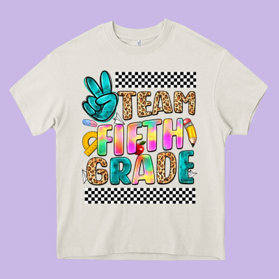 Team Fifth Grade Heavy Core Tee Designed By Nancycooperartshop
