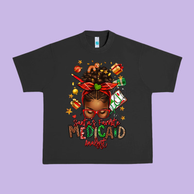 Santa's Favorite Medicaid Analyst Afro Messy Bun Urban Heavy Tee Designed By Texasbilliewilder