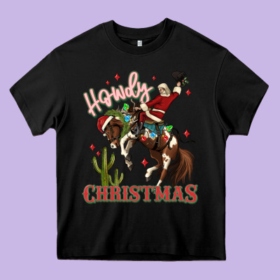 Howdy Christmas Cowboy Santa Heavy Core Tee Designed By Maliassmallbusiness