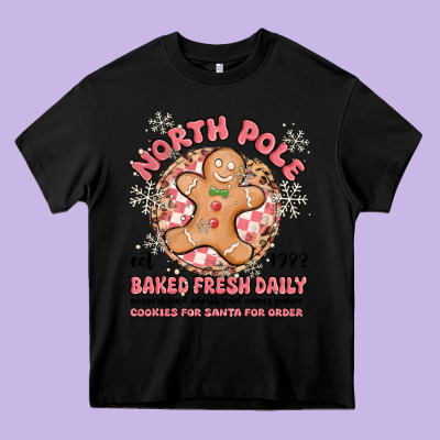 North Pole Baked Fresh Daily Heavy Core Tee Designed By Maliassmallbusiness
