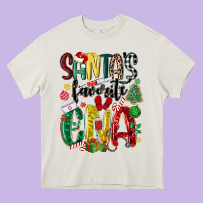 Santas Favorite Cna Nurse Heavy Core Tee Designed By Maliassmallbusiness