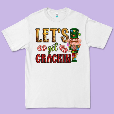 Let's Get Crackin Christmas Premium Tee Designed By Nancycooperartshop