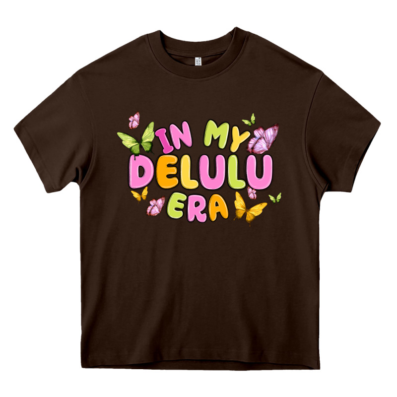 In My Delulu Era Heavy Core Tee by MaliasSmallBusiness | Teevron