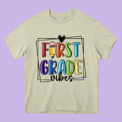 1st Grade Vibes Heavy Core Tee Designed By Maliassmallbusiness