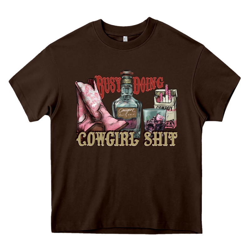 Busy Doing Cowgirl Shit Liquor Boots Cigarette Heavy Core Tee by NancyCooperArtShop | Teevron