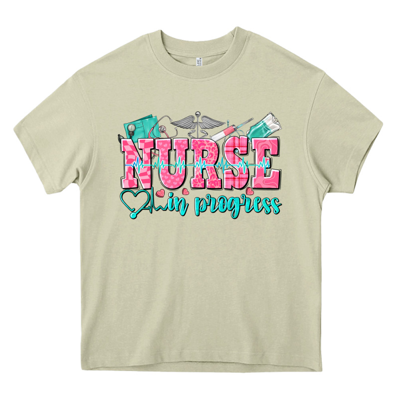 Nurse In Progress Heavy Core Tee by NancyCooperArtShop | Teevron