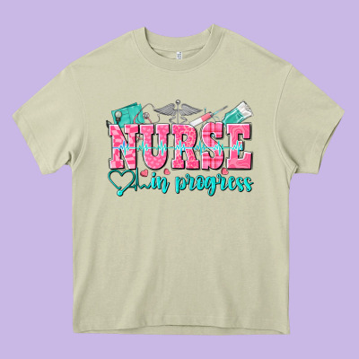 Nurse In Progress Heavy Core Tee Designed By Nancycooperartshop