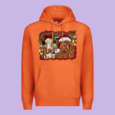 Christmas Heifer And Highland Cow With Serape Background Premium Hoodie Designed By Ranaportraitstore