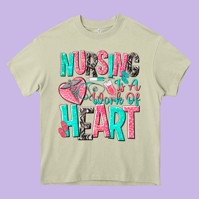 Nursing Is A Work Of Heart Heavy Core Tee Designed By Nancycooperartshop