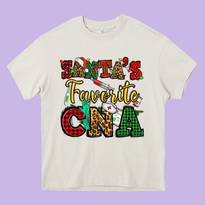 Santas Favorite Cna Christmas Heavy Core Tee Designed By Nancycooperartshop