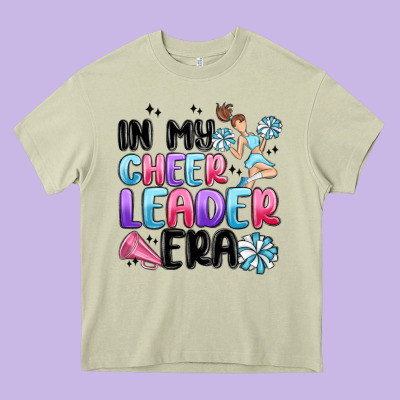 In My Cheer Leader Era Heavy Core Tee Designed By Maliassmallbusiness