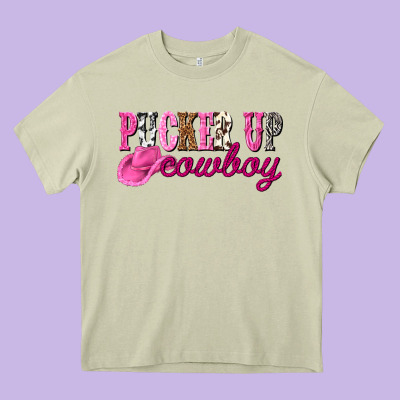 Pucker Up Cowboy Heavy Core Tee Designed By Nancycooperartshop
