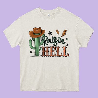 Raisin Hell Cowboy Cactus Heavy Core Tee Designed By Maliassmallbusiness