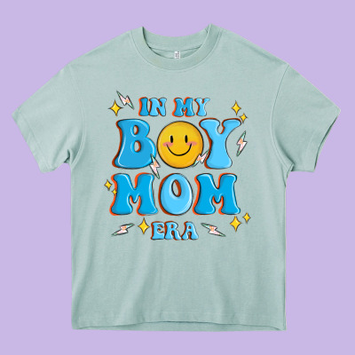 In My Boy Mom Era Heavy Core Tee Designed By Maliassmallbusiness