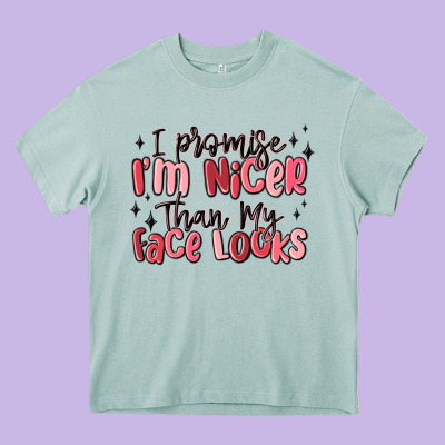 I Promise I'm Nicer Than My Face Looks Heavy Core Tee Designed By Maliassmallbusiness