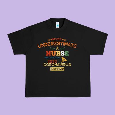 Never Underestimate A Nurse Urban Heavy Tee Designed By Bettercallsaul