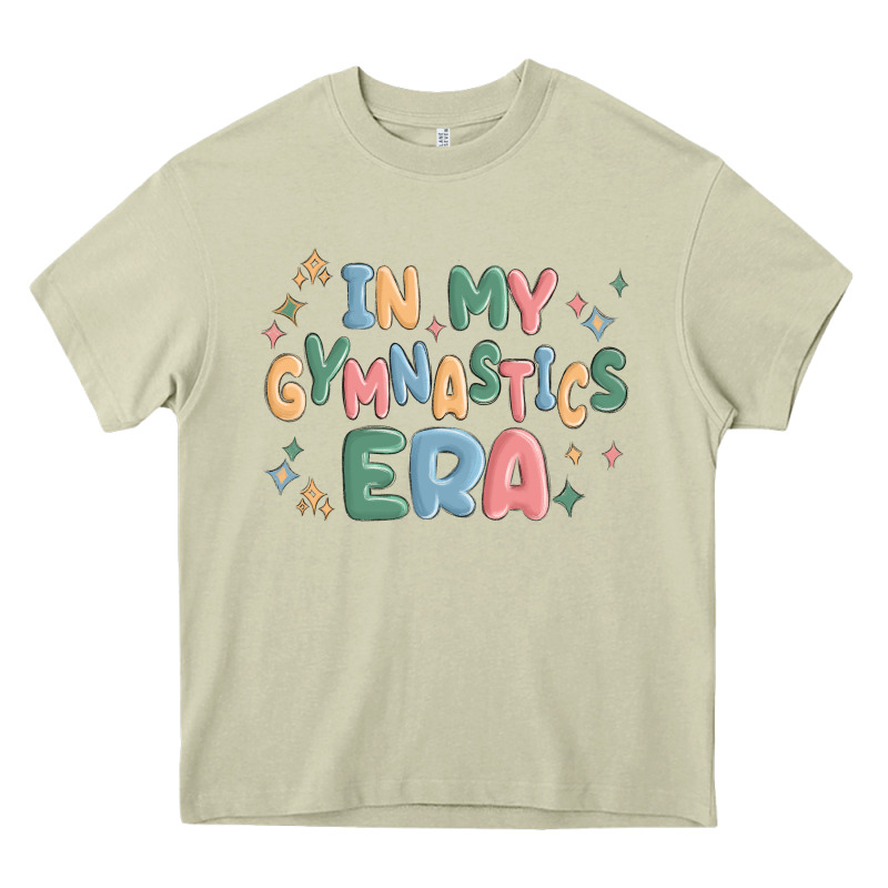 In My Gymnastics Era Heavy Core Tee by MaliasSmallBusiness | Teevron