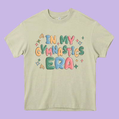In My Gymnastics Era Heavy Core Tee Designed By Maliassmallbusiness