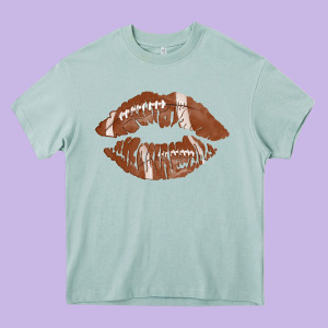 Football Lips Heavy Core Tee Designed By Adodesignshop