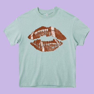 Football Lips Heavy Core Tee Designed By Adodesignshop