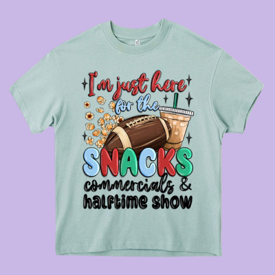 Im Just Here For The Snacks Commercials And  Halftime Show Heavy Core Tee Designed By Maliassmallbusiness