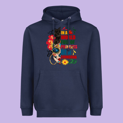 In A World Full Of Princess Be A Chingona Heavyweight Hoodie Designed By Bundleandbundleshop