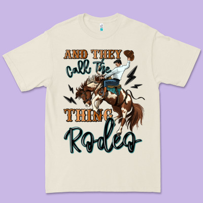 And They Call The Thing Rodeo Cowboy Premium Tee Designed By Maliassmallbusiness