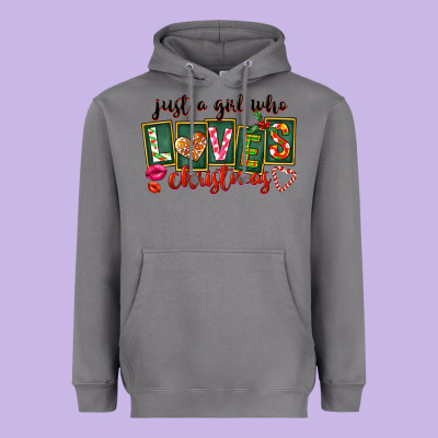 Just A Girl Who Loves Christmas Heavyweight Hoodie Designed By Fadigitalartstudio