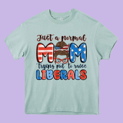 Just A Normal Mom Trying Not To Raise Liberals Heavy Core Tee Designed By Maliassmallbusiness