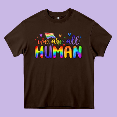 We Are All Human Heavy Core Tee Designed By Maliassmallbusiness