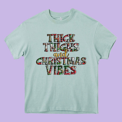 Thick Thighs And Christmas Vibes Heavy Core Tee Designed By Adodesignshop