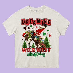 Dreaming Of A Wild West Christmas Cowboy Santa Heavy Core Tee Designed By Maliassmallbusiness