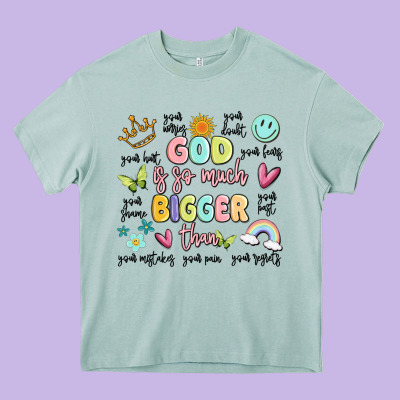God Is So Much Bigger Than Malia Heavy Core Tee Designed By Maliassmallbusiness