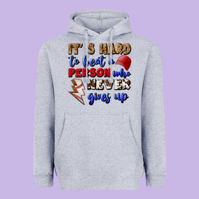 It's Hard To Beat A Person Who Never Gives Up Heavyweight Hoodie Designed By Bundleandbundleshop