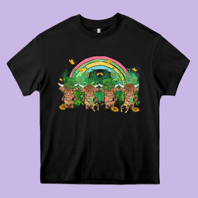 St Patrick's Day Baby Highland Cow Heavy Core Tee Designed By Maliassmallbusiness