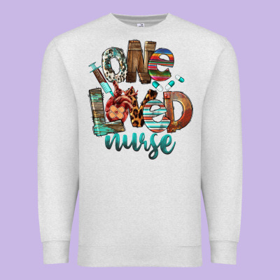One Loved Nurse Premium Sweatshirt Designed By Fadigitalartstudio