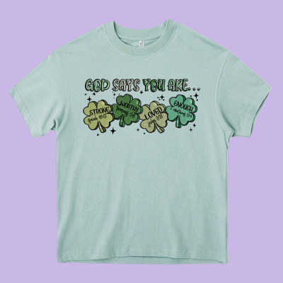 God Says I Am Patrick's Day Heavy Core Tee Designed By Maliassmallbusiness