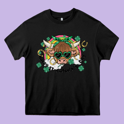 St. Patrick's Day Highland Cow Heavy Core Tee Designed By Maliassmallbusiness