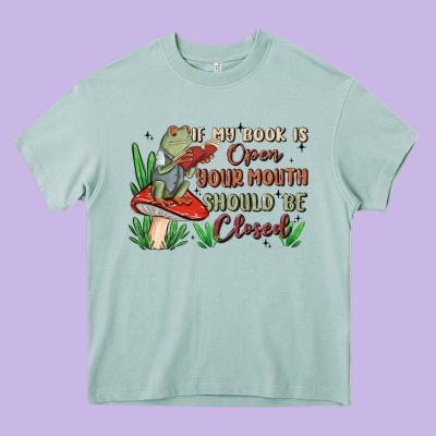 If My Book Is Open Your Mouth Should Be Closed Malia Heavy Core Tee Designed By Maliassmallbusiness