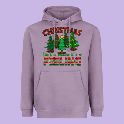 Christmas Isn't A Season It's A Feeling Heavyweight Hoodie Designed By Bundleandbundleshop