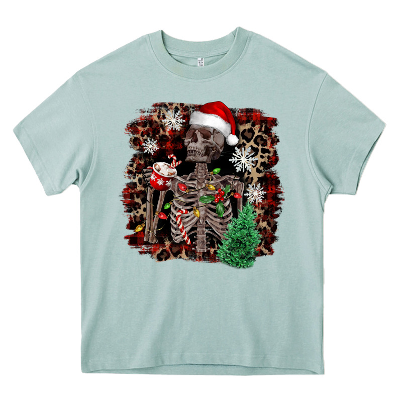Skeleton With Coffee Cup Christmas Heavy Core Tee by NancyCooperArtShop | Teevron