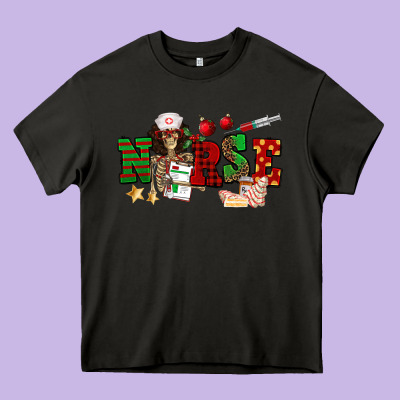 Christmas Nurse Heavy Core Tee Designed By Nancycooperartshop